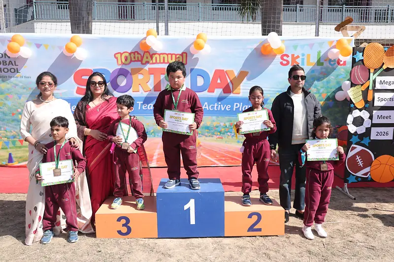 Winners on the podium at the 10th Annual Sports Day