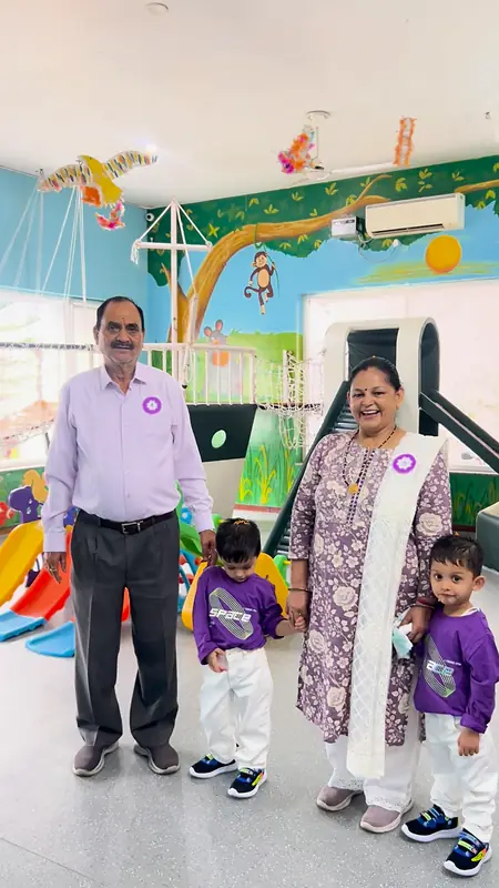 Grandparents arrive with their grandchildren in the play zone