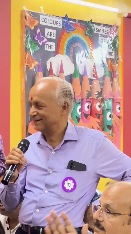A grandfather shares a story with the hall